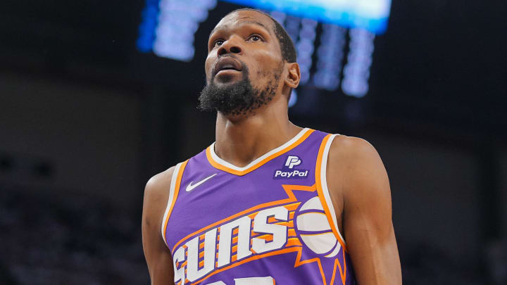 Apr 23, 2024; Minneapolis, Minnesota, USA; Phoenix Suns forward Kevin Durant (35) walks back to the bench against the Minnesota Timberwolves in the second quarter during game two of the first round for the 2024 NBA playoffs at Target Center. Mandatory Credit: Brad Rempel-USA TODAY Sports