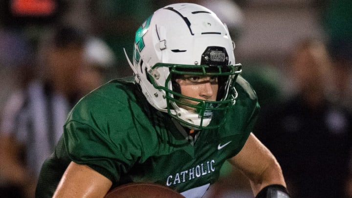 Owensboro Catholic   s Brady Atwell (7) runs the ball as the Union County Braves play the Owensboro Catholic Aces at Steele Stadium in Owensboro, Ky., Friday evening, Sept. 3, 2021.

Union Vs Oc 15