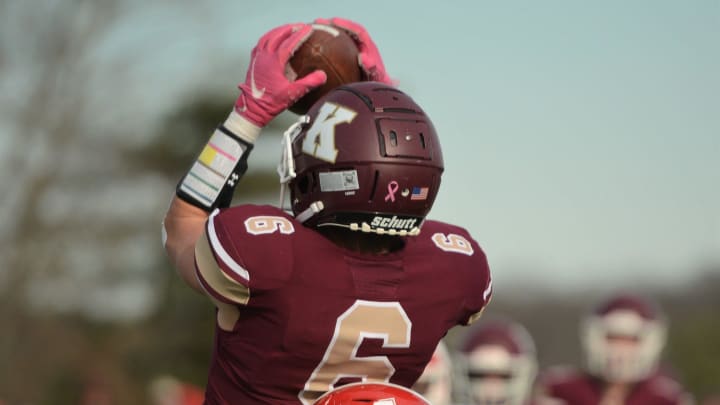 Killingly senior Ben Jax leaps up and makes the catch against Masuk's Tariq Al-Hameedi on Sunday at Morgan Field.

Jax