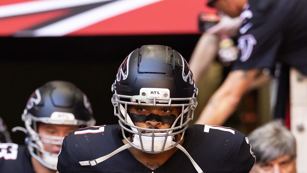 Dec 21, 2025; Glendale, Arizona, USA; Atlanta Falcons offensive lineman Elijah Wilkinson (71) against the Arizona Cardinals at State Farm Stadium. Mandatory Credit: Mark J. Rebilas-Imagn Images