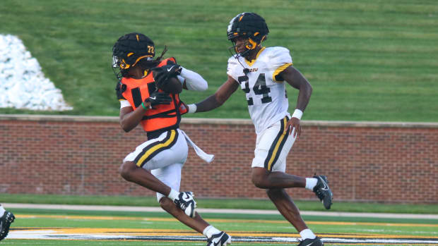 Missouri Tigers cornerback Nic Deloach (24) in coverage at the team's annual fan night practice at Faurot Field.