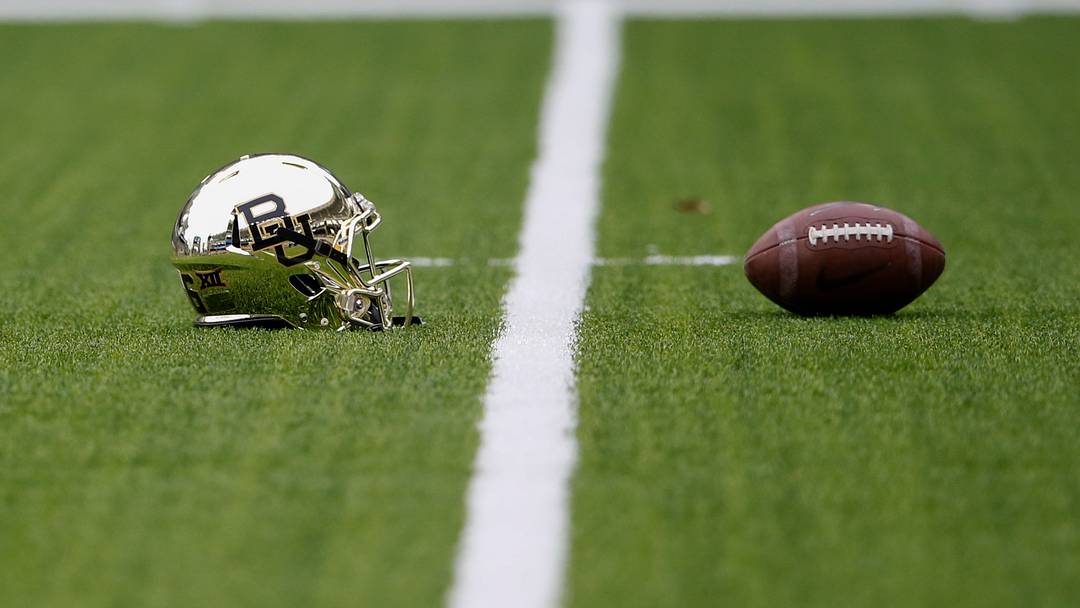Oct 11, 2014; Waco, TX, USA; Baylor Bears helmet and football before the game against the TCU Horned Frogs at McLane Stadium. Mandatory Credit: Kevin Jairaj-USA TODAY Sports Oct 11, 2014; Waco, TX, USA; Baylor Bears helmet and football before the game against the TCU Horned Frogs at McLane Stadium. Mandatory Credit: Kevin Jairaj-USA TODAY Sports