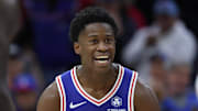 Oct 27, 2025; Philadelphia, Pennsylvania, USA; Philadelphia 76ers guard VJ Edgecombe (77) reacts to guard Tyrese Maxey (0) three pointer against the Orlando Magic during the fourth quarter at Xfinity Mobile Arena. Mandatory Credit: Bill Streicher-Imagn Images