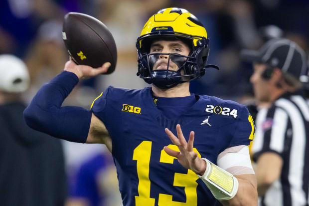 Michigan QBs Alex Orji, Jack Tuttle and Davis Warren are competing for the Wolverines' starting quarterback job in 2024