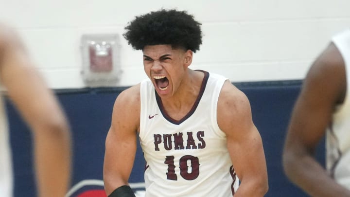 Perry Pumas forward Koa Peat (10) screams out after a dunk against the Basha Bears at Perry High School in Gilbert on Jan. 6, 2024.