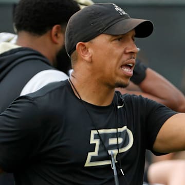 Purdue Boilermakers head coach Ryan Walters yells down field 