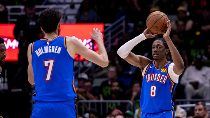 Apr 29, 2024; New Orleans, Louisiana, USA; Oklahoma City Thunder forward Jalen Williams (8) passes the ball to forward Chet Holmgren (7) against the New Orleans Pelicans during the first half of game four of the first round for the 2024 NBA playoffs at Smoothie King Center. Mandatory Credit: Stephen Lew-USA TODAY Sports