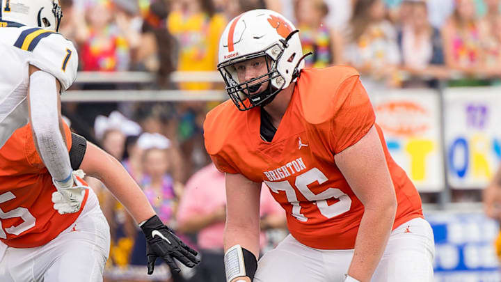Brighton's Hayden Lorius sets the pass protection during the Bulldogs' 42-3 loss to Saline Thursday, Aug. 24, 2023.