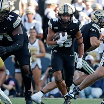 Purdue Boilermakers running back Devin Mockobee (45) runs with the ball 