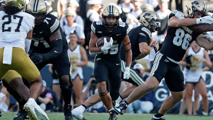 Purdue Boilermakers running back Devin Mockobee (45) runs with the ball 