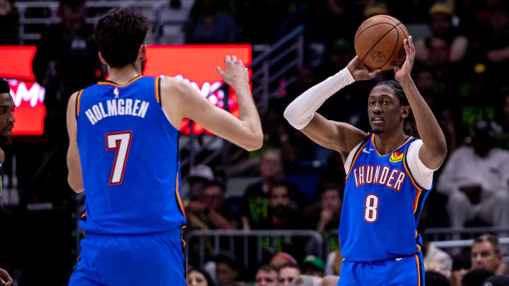 Apr 29, 2024; New Orleans, Louisiana, USA; Oklahoma City Thunder forward Jalen Williams (8) passes the ball to forward Chet Holmgren (7) against the New Orleans Pelicans during the first half of game four of the first round for the 2024 NBA playoffs at Smoothie King Center. Mandatory Credit: Stephen Lew-USA TODAY Sports