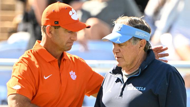 Clemson Tigers head coach Dabo Swinney with North Carolina Tar Heels head coach Bill Belichick