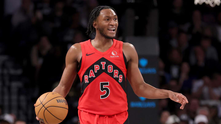 Apr 10, 2024; Brooklyn, New York, USA; Toronto Raptors guard Immanuel Quickley (5) handles the ball against the Brooklyn Nets during the fourth quarter at Barclays Center. Mandatory Credit: Brad Penner-USA TODAY Sports