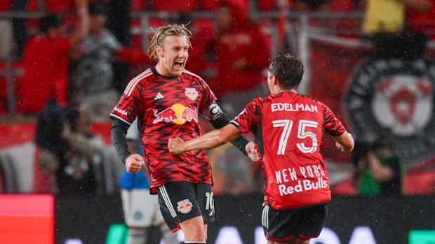 New York Red Bulls players celebrate after a goal. 