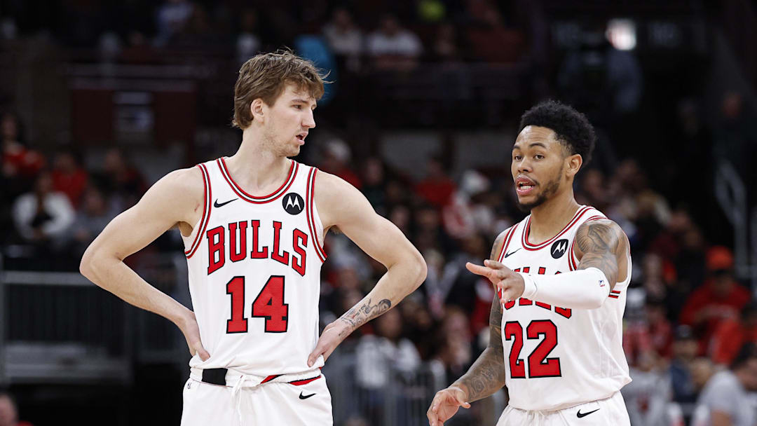 Feb 19, 2026; Chicago, Illinois, USA; Chicago Bulls forward Matas Buzelis (14) talks with Chicago Bulls guard Anfernee Simons (22) during the second half at United Center. Mandatory Credit: Kamil Krzaczynski-Imagn Images