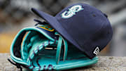 May 12, 2018; Detroit, MI, USA; Hat and glove of Seattle Mariners center fielder Dee Gordon (9) sits in dugout during the third inning against the Detroit Tigers at Comerica Park. 