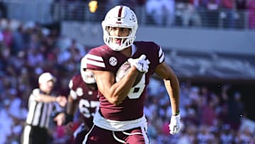 Oct 19, 2024; Starkville, Mississippi, USA; Mississippi State Bulldogs tight end Seydou Traore (18) runs the ball after a reception against Texas A&M Aggies defensive back Dalton Brooks (25) during the second quarter at Davis Wade Stadium at Scott Field. Mandatory Credit: Matt Bush-Imagn Images