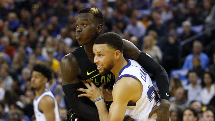 Mar 23, 2018; Oakland, CA, USA; Golden State Warriors guard Stephen Curry (30) is fouled by Atlanta Hawks guard Dennis Schroder (17) in the second quarter at Oracle Arena. Mandatory Credit: Cary Edmondson-USA TODAY Sports