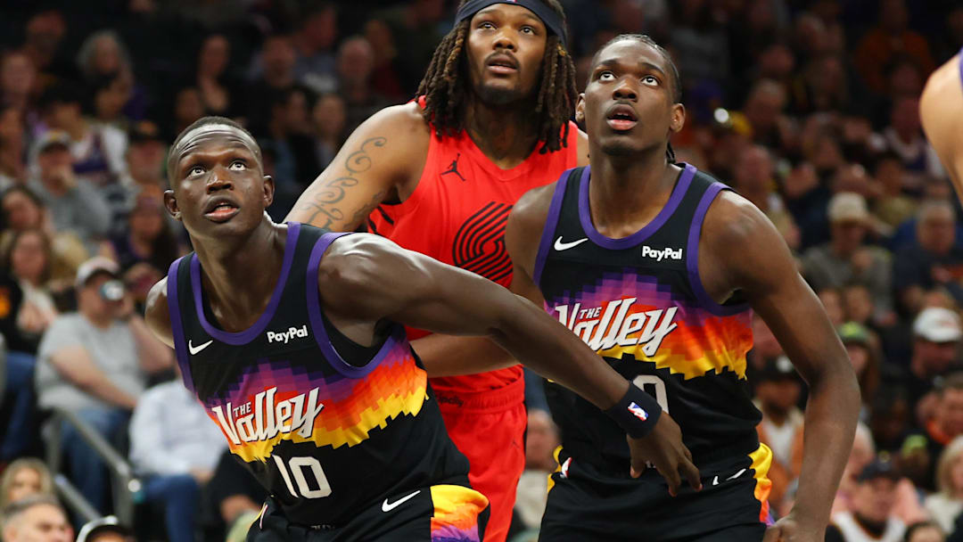 Feb 22, 2026; Phoenix, Arizona, USA; Phoenix Suns center Khaman Maluach (10) and forward Rasheer Fleming (20) against the Portland Trail Blazers at Mortgage Matchup Center. Mandatory Credit: Mark J. Rebilas-Imagn Images