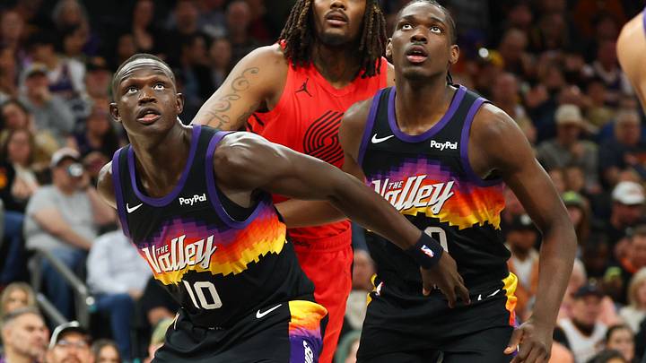 Feb 22, 2026; Phoenix, Arizona, USA; Phoenix Suns center Khaman Maluach (10) and forward Rasheer Fleming (20) against the Portland Trail Blazers at Mortgage Matchup Center. Mandatory Credit: Mark J. Rebilas-Imagn Images