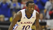 March 09, 2012; Kansas City, MO, USA; Kansas Jayhawks guard Tyshawn Taylor (10) plays defense during the second half of the game against the Baylor Bears in the semifinal round of the 2012 Big 12 Tournament at the Sprint Center. Baylor won Mandatory Credit: Denny Medley-Imagn Images