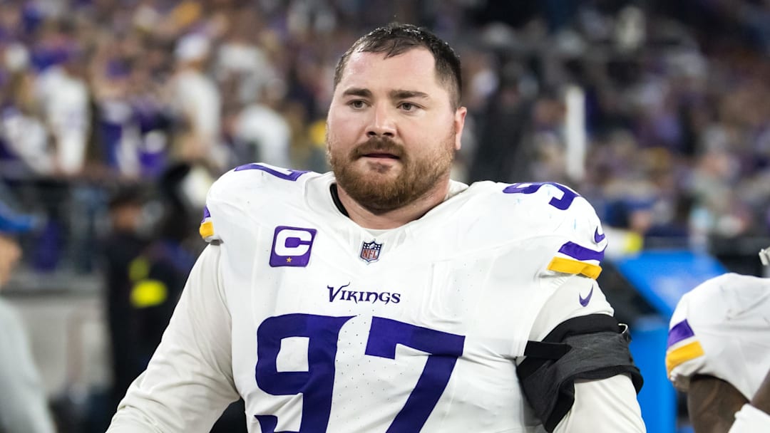 Jan 13, 2025; Glendale, AZ, USA; Minnesota Vikings defensive lineman Harrison Phillips (97) against the Los Angeles Rams during an NFC wild card game at State Farm Stadium. Mandatory Credit: Mark J. Rebilas-Imagn Images