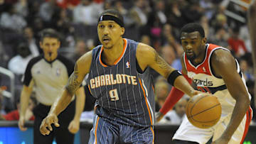 Apr 23, 2012; Washington, DC, USA; Charlotte Bobcats small forward Jamario Moon (9) dribbles past Washington Wizards small forward Chris Singleton (31) during the second half at the Verizon Center. The Wizards defeated the Bobcats 101 - 73. Mandatory Credit: Brad Mills-Imagn Images