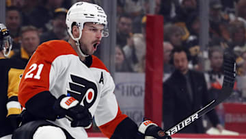 Feb 25, 2024; Pittsburgh, Pennsylvania, USA;  Philadelphia Flyers center Scott Laughton (21) reacts after scoring a goal against the Pittsburgh Penguins during the first period at PPG Paints Arena. Mandatory Credit: Charles LeClaire-Imagn Images