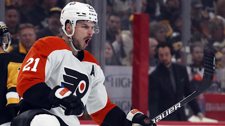 Feb 25, 2024; Pittsburgh, Pennsylvania, USA;  Philadelphia Flyers center Scott Laughton (21) reacts after scoring a goal against the Pittsburgh Penguins during the first period at PPG Paints Arena. Mandatory Credit: Charles LeClaire-Imagn Images