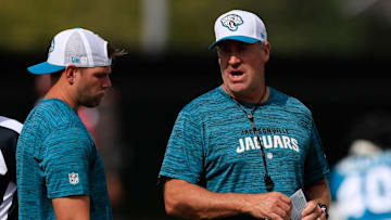 Jacksonville Jaguars head coach Doug Pederson, center, and offensive coordinator Press Taylor talk during a combined NFL football training camp session between the Tampa Bay Buccaneers and Jacksonville Jaguars Thursday, Aug. 15, 2024 at EverBank Stadium’s Miller Electric Center in Jacksonville, Fla. [Corey Perrine/Florida Times-Union]