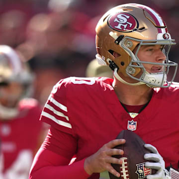 Nov 9, 2025; Santa Clara, California, USA; San Francisco 49ers quarterback Mac Jones (10) warms up prior to the game against the Los Angeles Rams at Levi's Stadium. 