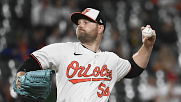 May 29, 2024; Baltimore, Maryland, USA;  Baltimore Orioles relief pitcher Danny Coulombe (54) throws a eighth inning pitch against the Boston Red Sox at Oriole Park at Camden Yards. Mandatory Credit: Tommy Gilligan-Imagn Images
