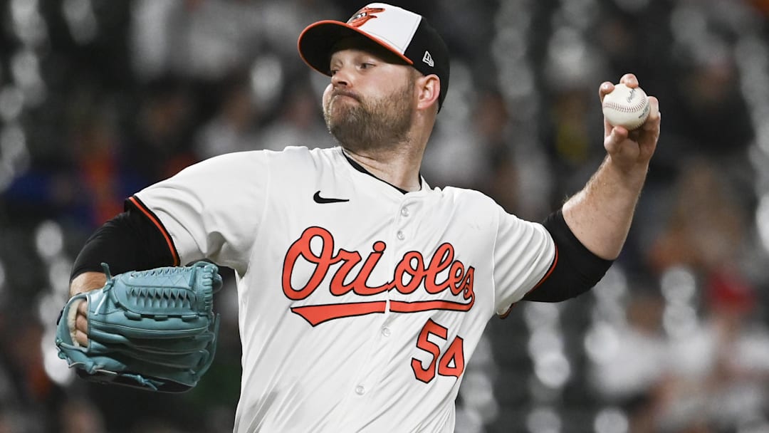 May 29, 2024; Baltimore, Maryland, USA;  Baltimore Orioles relief pitcher Danny Coulombe (54) throws a eighth inning pitch against the Boston Red Sox at Oriole Park at Camden Yards.