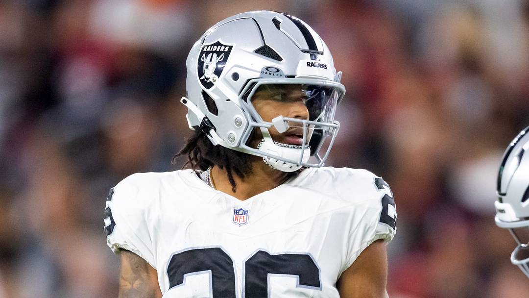 Aug 23, 2025; Glendale, Arizona, USA; Las Vegas Raiders cornerback Darien Porter (26) against the Arizona Cardinals during a preseason NFL game at State Farm Stadium. Mandatory Credit: Mark J. Rebilas-Imagn Images