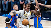 Oct 23, 2025; Indianapolis, Indiana, USA; Indiana Pacers guard Bennedict Mathurin (00) has his shoot attempt blocked by Oklahoma City Thunder center Isaiah Hartenstein (55) in the first half at Gainbridge Fieldhouse. Mandatory Credit: Trevor Ruszkowski-Imagn Images