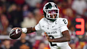 Sep 20, 2025; Los Angeles, California, USA; Michigan State Spartans quarterback Aidan Chiles (2) throws against the Southern California Trojans during the second half at the Los Angeles Memorial Coliseum.