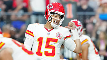 Oct 27, 2024; Paradise, Nevada, USA; Kansas City Chiefs quarterback Patrick Mahomes (15) talks to Kansas City Chiefs wide receiver Xavier Worthy (1) before snapping the ball against the Las Vegas Raiders during the third quarter at Allegiant Stadium. Mandatory Credit: Stephen R. Sylvanie-Imagn Images