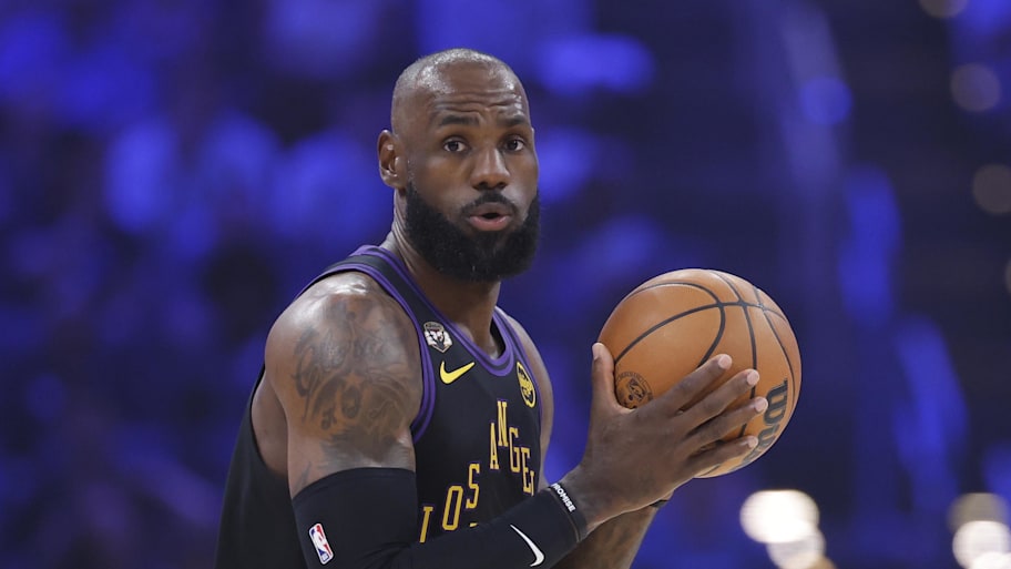 Los Angeles Lakers forward LeBron James moves the ball down the court.