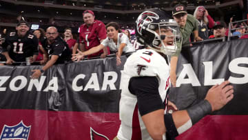 Atlanta Falcons quarterback Desmond Ridder (9) celebrates his touchdown run against the Arizona