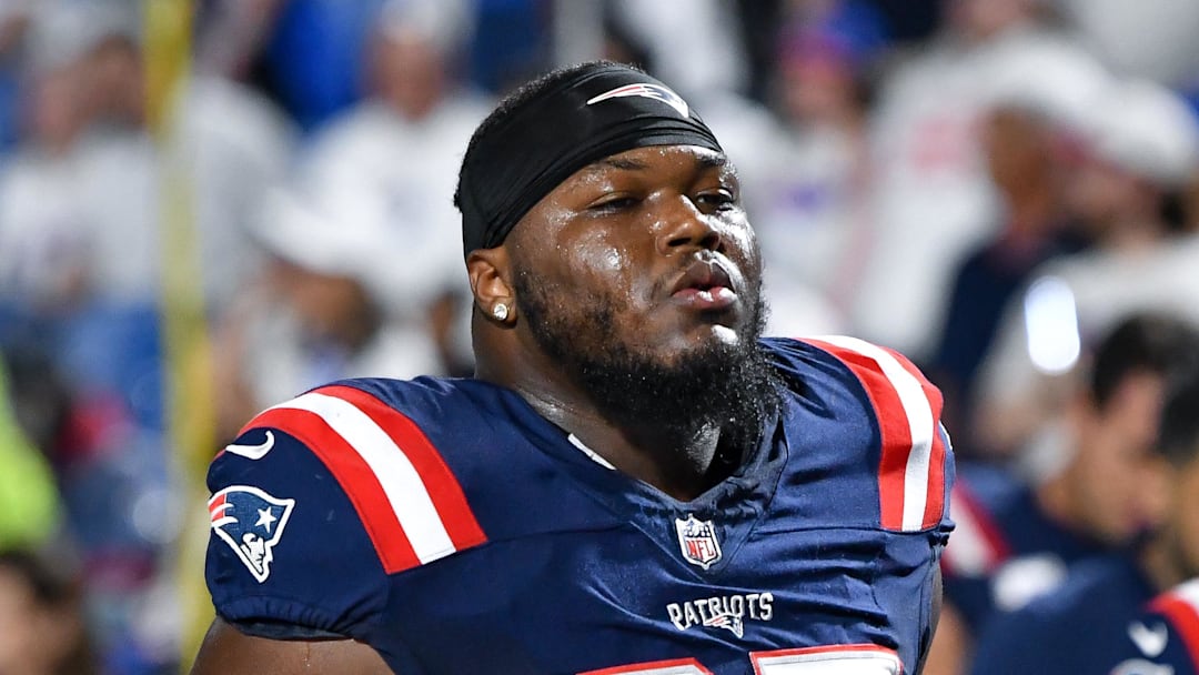 Oct 5, 2025; Orchard Park, New York, USA; New England Patriots defensive end Milton Williams (97) leaves the field after warming up before a game against the Buffalo Bills at Highmark Stadium. Mandatory Credit: Mark Konezny-Imagn Images