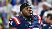 Oct 5, 2025; Orchard Park, New York, USA; New England Patriots defensive end Milton Williams (97) leaves the field after warming up before a game against the Buffalo Bills at Highmark Stadium. Mandatory Credit: Mark Konezny-Imagn Images