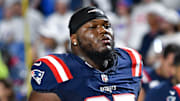 Oct 5, 2025; Orchard Park, New York, USA; New England Patriots defensive end Milton Williams (97) leaves the field after warming up before a game against the Buffalo Bills at Highmark Stadium. Mandatory Credit: Mark Konezny-Imagn Images