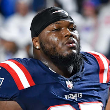 Oct 5, 2025; Orchard Park, New York, USA; New England Patriots defensive end Milton Williams (97) leaves the field after warming up before a game against the Buffalo Bills at Highmark Stadium. Mandatory Credit: Mark Konezny-Imagn Images
