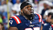 Oct 5, 2025; Orchard Park, New York, USA; New England Patriots defensive end Milton Williams (97) leaves the field after warming up before a game against the Buffalo Bills at Highmark Stadium. Mandatory Credit: Mark Konezny-Imagn Images