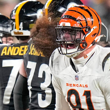 Cincinnati Bengals defensive end Trey Hendrickson (91) celebrates a stop in the fourth quarter of the NFL Week 18 game between the Pittsburgh Steelers and the Cincinnati Bengals at Acrisure Stadium in Pittsburgh on Saturday, Jan. 4, 2025. The Bengals won 19-17 to finish the regular season at 9-8.