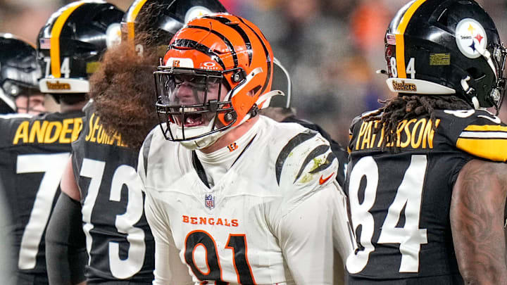 Cincinnati Bengals defensive end Trey Hendrickson (91) celebrates a stop in the fourth quarter of the NFL Week 18 game between the Pittsburgh Steelers and the Cincinnati Bengals at Acrisure Stadium in Pittsburgh on Saturday, Jan. 4, 2025. The Bengals won 19-17 to finish the regular season at 9-8.