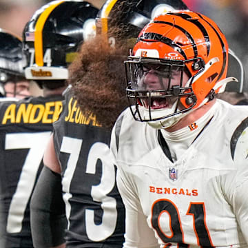 Cincinnati Bengals defensive end Trey Hendrickson (91) celebrates a stop in the fourth quarter of the NFL Week 18 game between the Pittsburgh Steelers and the Cincinnati Bengals at Acrisure Stadium in Pittsburgh on Saturday, Jan. 4, 2025. The Bengals won 19-17 to finish the regular season at 9-8.