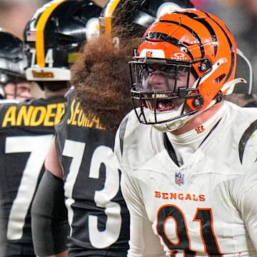Cincinnati Bengals defensive end Trey Hendrickson (91) celebrates a stop in the fourth quarter of the NFL Week 18 game between the Pittsburgh Steelers and the Cincinnati Bengals at Acrisure Stadium in Pittsburgh on Saturday, Jan. 4, 2025. The Bengals won 19-17 to finish the regular season at 9-8.