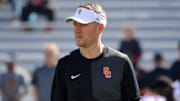 Sep 27, 2025; Champaign, Illinois, USA;  Southern California Trojans head coach Lincoln Riley before an NCAA football game with the Illinois Fighting Illini at Memorial Stadium. Mandatory Credit: Ron Johnson-Imagn Images