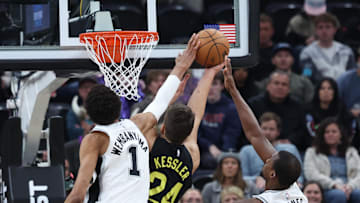 Oct 31, 2024; Salt Lake City, Utah, USA; San Antonio Spurs center Victor Wembanyama (1) and forward Harrison Barnes (40) block the shot of Utah Jazz center Walker Kessler (24) during the first quarter at Delta Center.